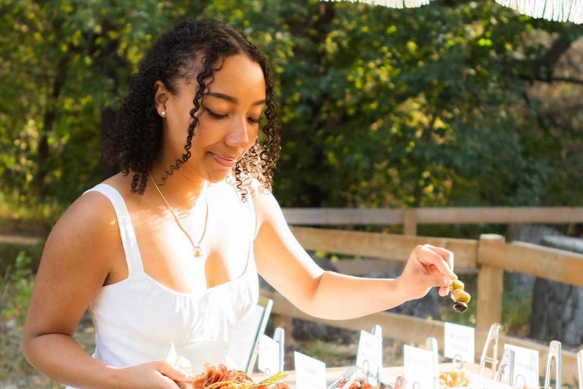 Event planner collaborating on charcuterie setup