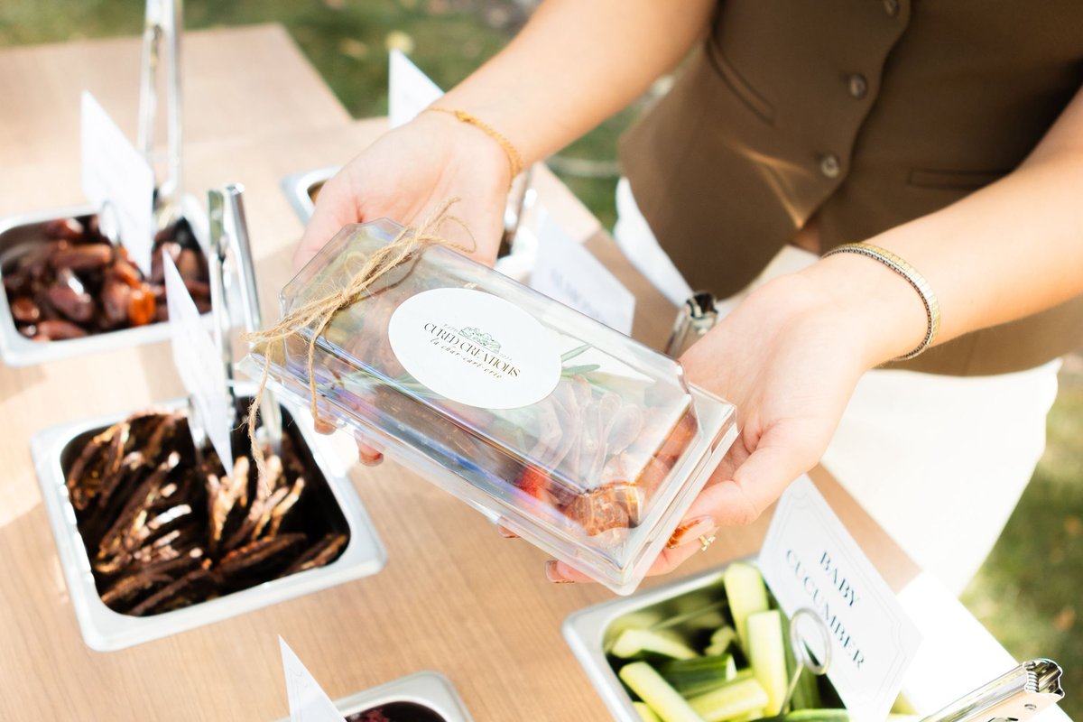 Grand tasting charcuterie experience with multi-station layout at an Edmonton event