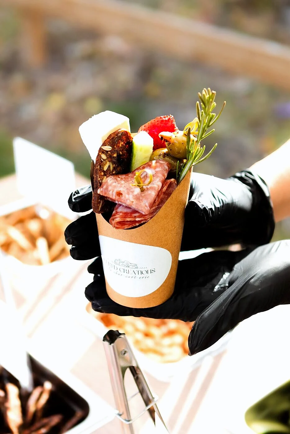 An individual charcuterie cup