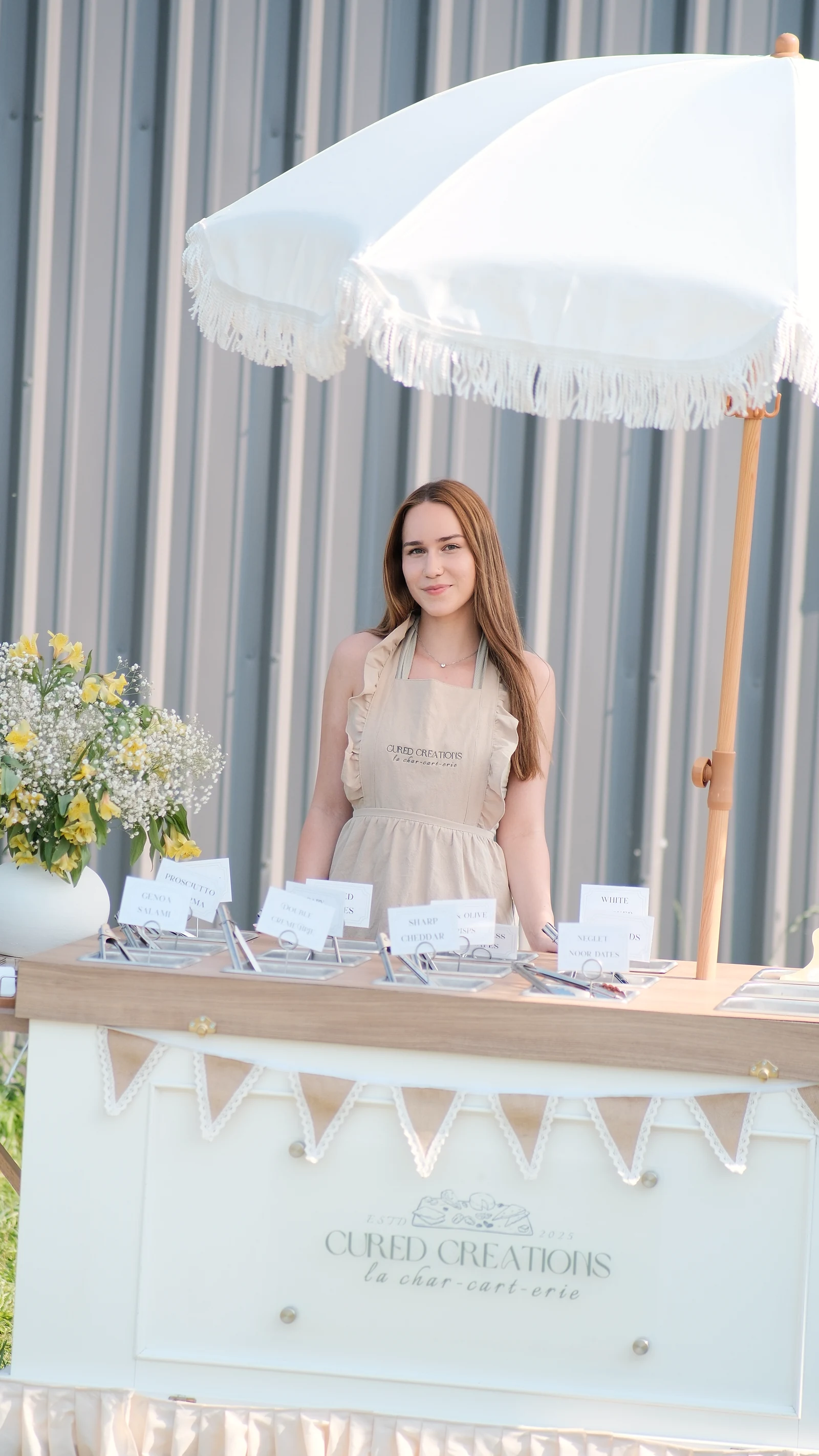 Sarah Jean behind her Cured Creations cart